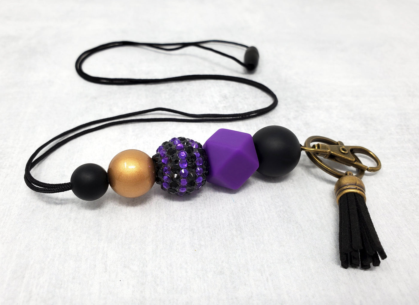 Black, Purple, and Gold Silicone Lanyard